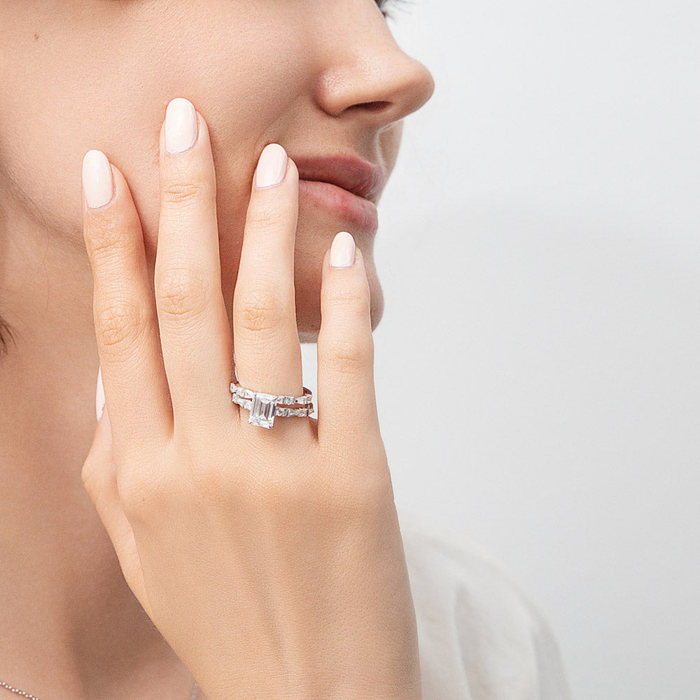 Model wearing Solitaire Art Deco Emerald Cut CZ Ring Set in Sterling Silver, 2 of 12