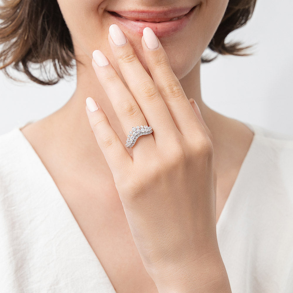 Model wearing Solitaire Chevron Crown Graduated CZ Ring Set in Sterling Silver, 17 of 18