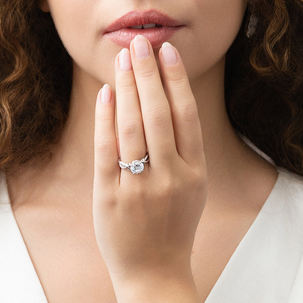 Model wearing Cable Woven Solitaire 2ct CZ Ring in Sterling Silver, 6 of 11