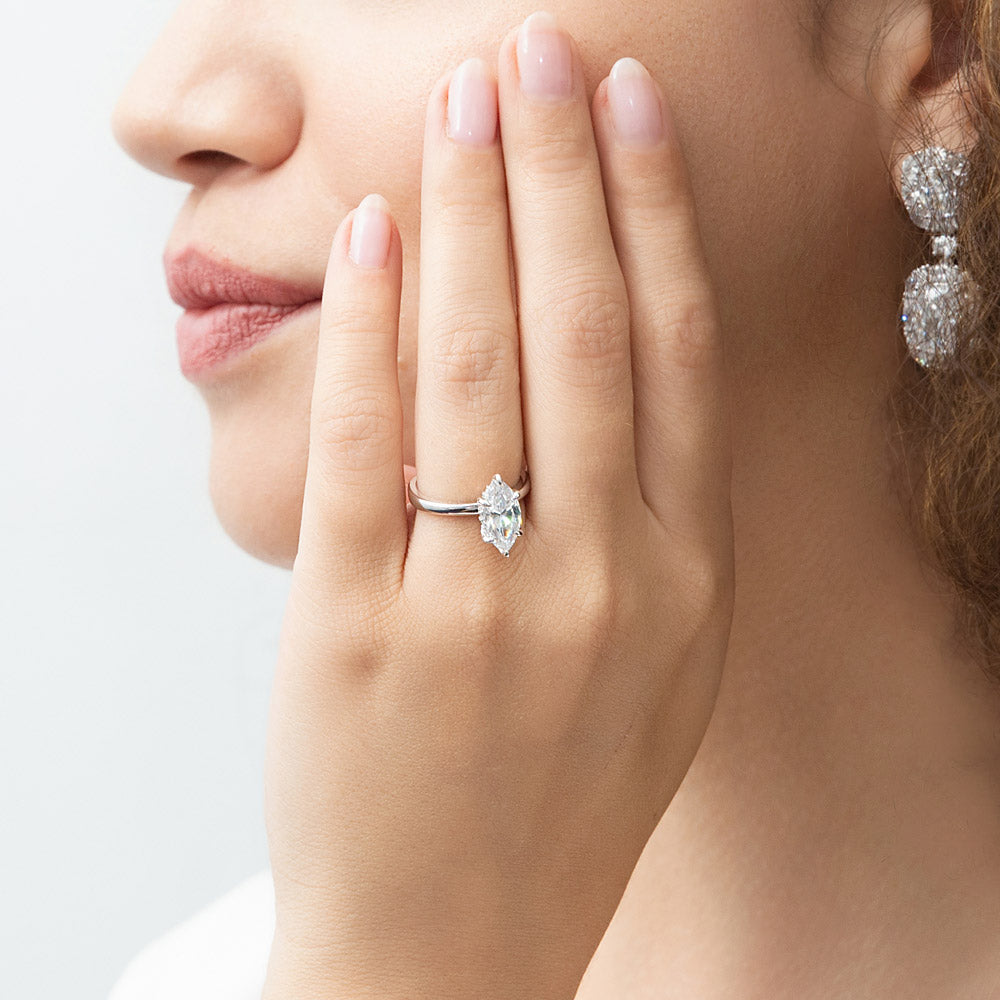 Model wearing Solitaire 1.6ct Marquise CZ Ring in Sterling Silver, 2 of 9