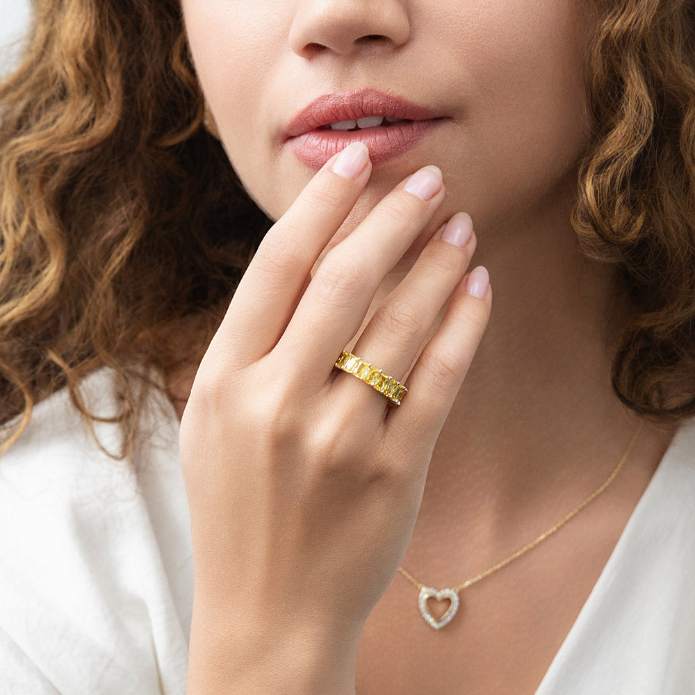 Model wearing Canary Yellow Pave Radiant CZ Eternity Ring in Sterling Silver, 2 of 10