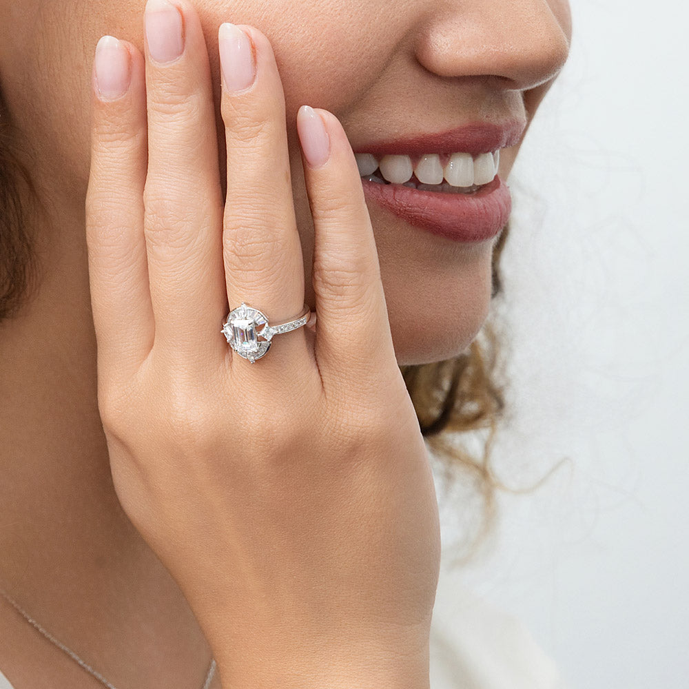 Model wearing Halo Art Deco Emerald Cut CZ Ring in Sterling Silver, 3 of 10