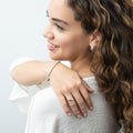 Model wearing Flexible CZ Bangle in Sterling Silver, 1.75mm / 6.5 inch