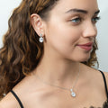 Model wearing Halo Clover Oval CZ Necklace in Sterling Silver, Clear Color