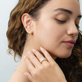 Model wearing Cable Ear Cuff Cartilage Earrings in Sterling Silver, Yellow Gold Flashed