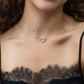 Model wearing Open Heart CZ Necklace in Sterling Silver, Rose Gold Flashed