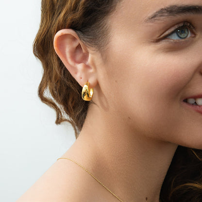 Model Wearing Dome Hoop Earrings