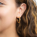 Model wearing Small Hoop Earrings, 1 inch, Gold-tone