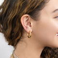 Model wearing Small Hoop Earrings, 1 inch, Gold-tone