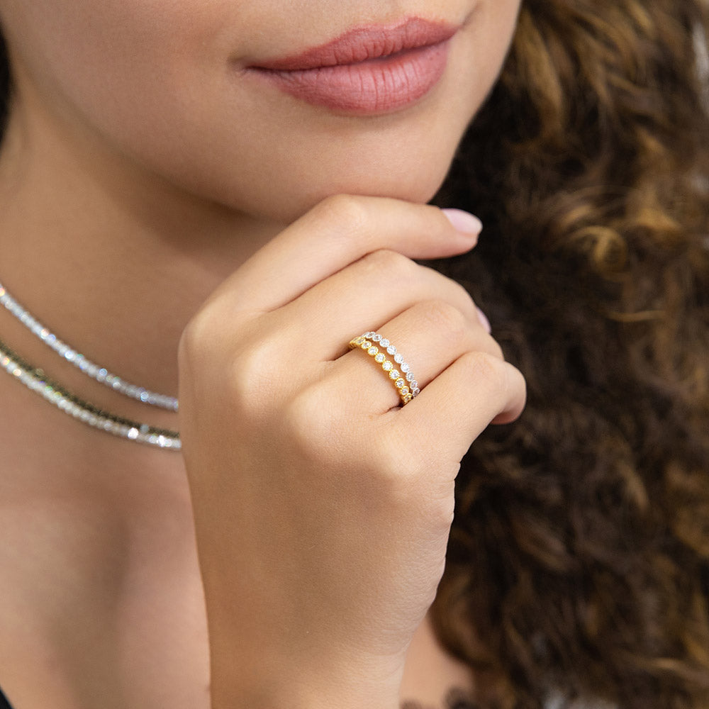 Model wearing Bubble Bezel CZ Eternity Ring Set in Gold Flashed Sterling Silver, 2 of 12