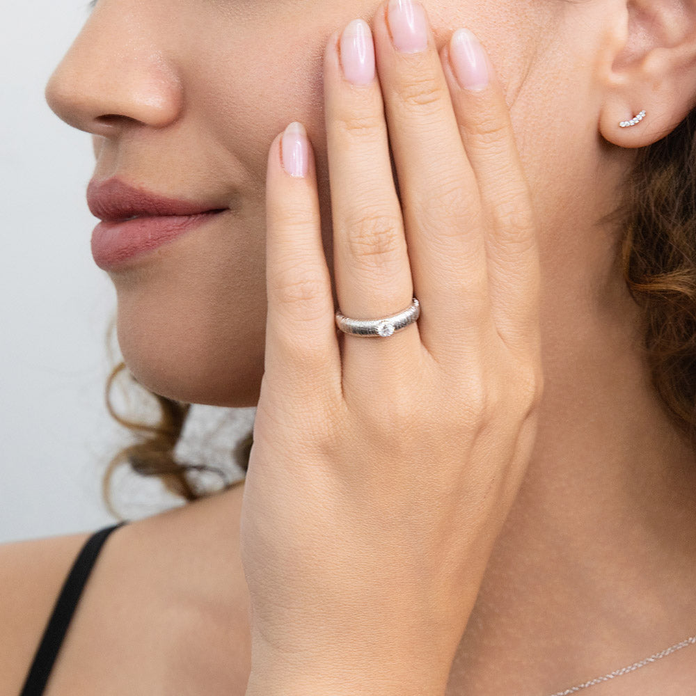 Model wearing Solitaire Bezel CZ Ring in Sterling Silver, 2 of 7