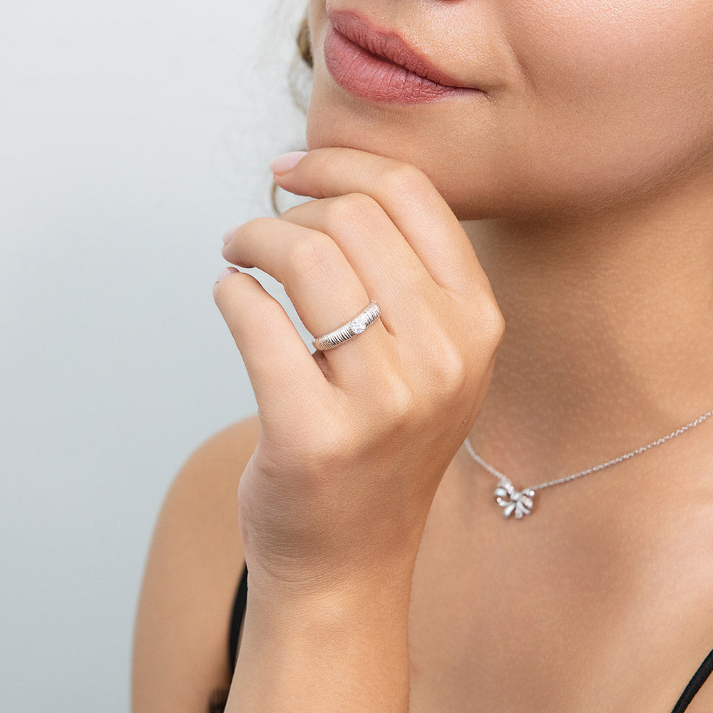 Model wearing Solitaire Bezel CZ Ring in Sterling Silver, 6 of 7