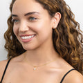 Model wearing North Star CZ Stud Earrings in Sterling Silver, Yellow Gold Flashed