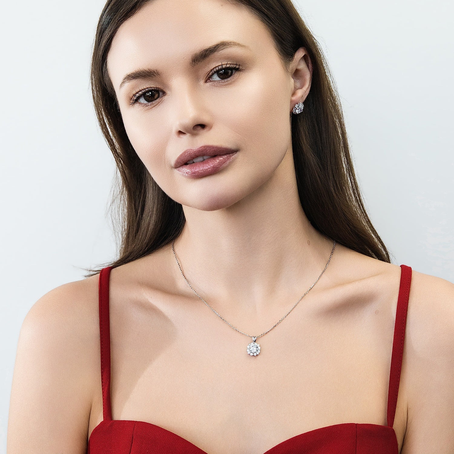 Model wearing Halo Flower CZ Stud Earrings in Sterling Silver, 4 of 5
