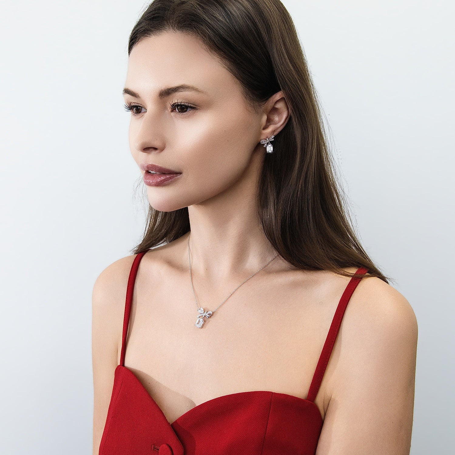 Model Wearing Bow Tie Necklace Style N1746-01, Ribbon Dangle Earrings Style E1909-01