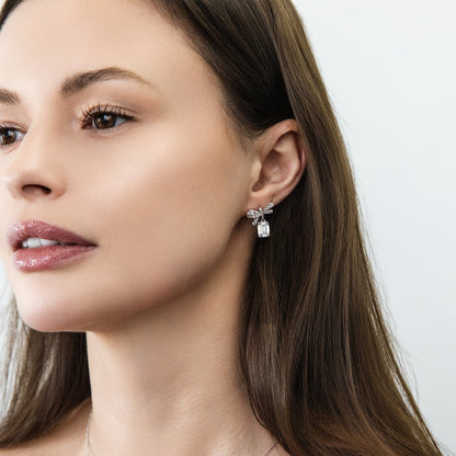 Model Wearing Ribbon Dangle Earrings Style E1909-01