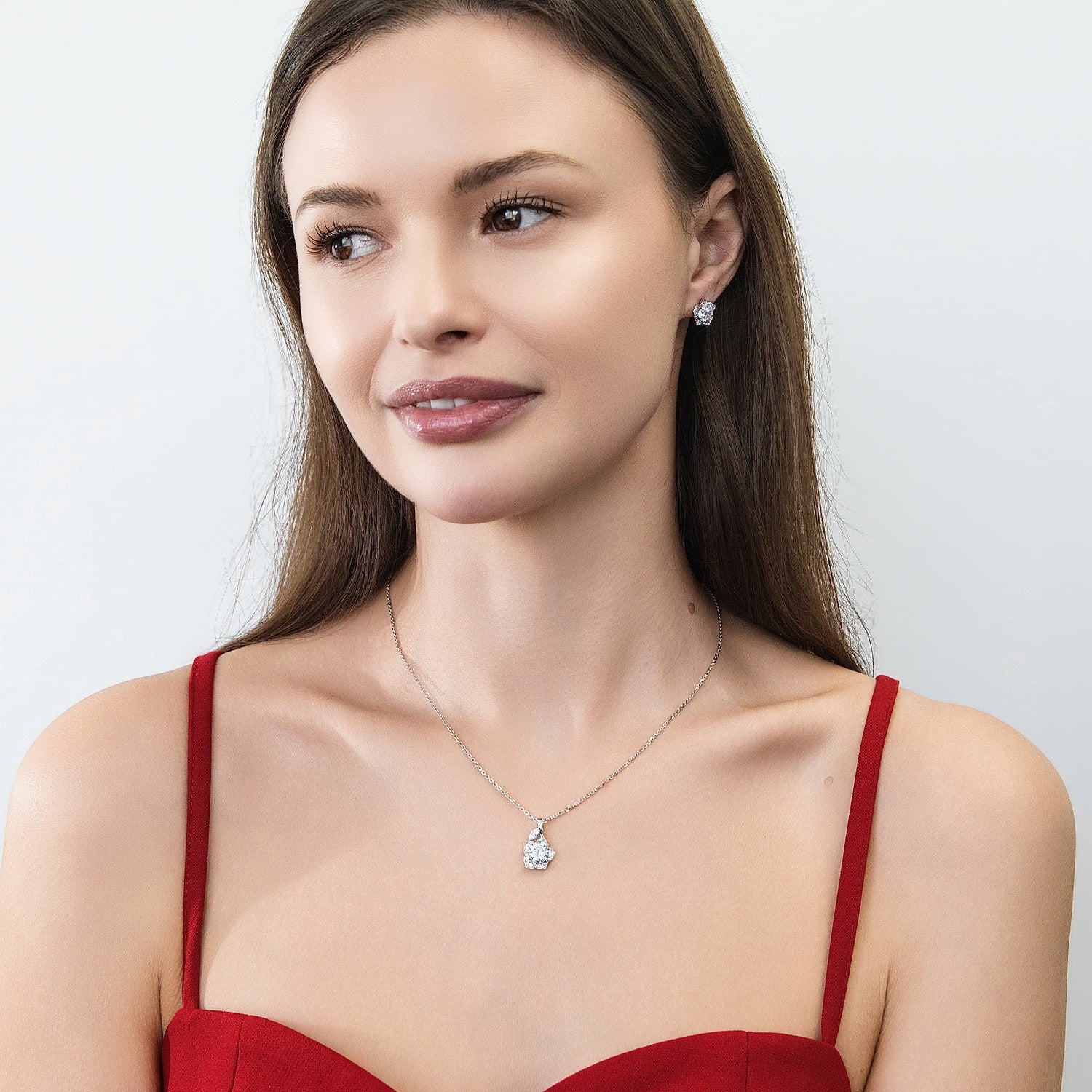 Model wearing Flower Halo CZ Necklace and Earrings in Sterling Silver, 10 of 12