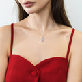 Model wearing Snake CZ Necklace and Earrings in Sterling Silver, Rhodium Plated