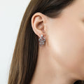 Model wearing Snake CZ Necklace and Earrings in Sterling Silver, Rhodium Plated