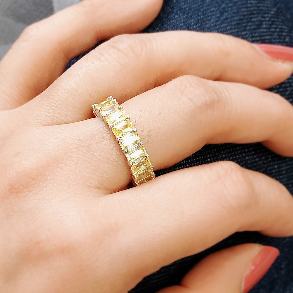 Model wearing Canary Yellow Pave Radiant CZ Eternity Ring in Sterling Silver, 7 of 10