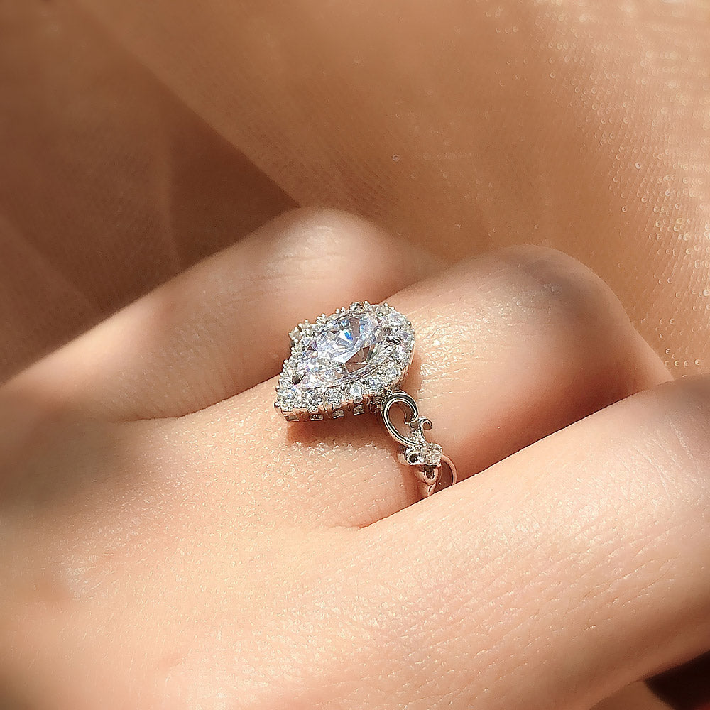 Model wearing Filigree Halo CZ Ring in Sterling Silver, 3 of 9