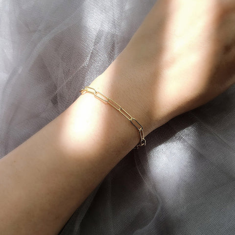 Model Wearing Paperclip Chain Bracelet