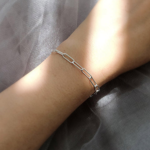 Model Wearing Paperclip Chain Bracelet
