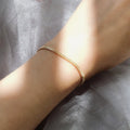 Model wearing Chain Bracelet in Sterling Silver 3mm, Yellow Gold Flashed