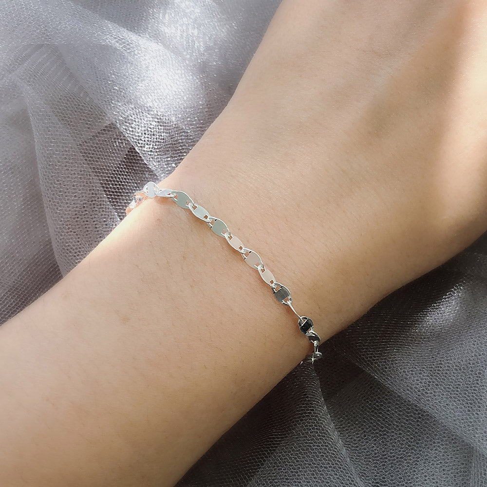 Model wearing Link Bracelet in Sterling Silver, Yellow Gold Flashed