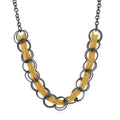 Open Circle Statement Necklace in Brass, Black And Gold-Tone