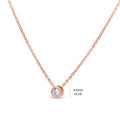 Front view of Solitaire Bezel CZ Necklace in Sterling Silver, Rose Gold Flashed