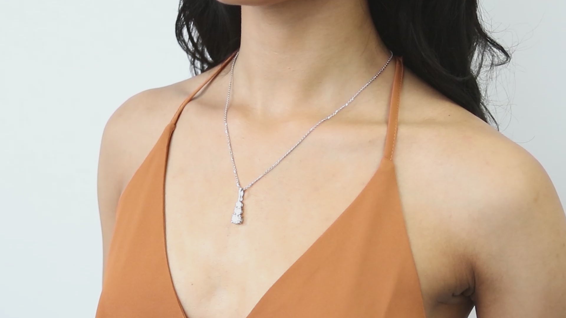 Video Contains 3-Stone Graduated Round CZ Pendant Necklace in Sterling Silver. Style Number N1537-01