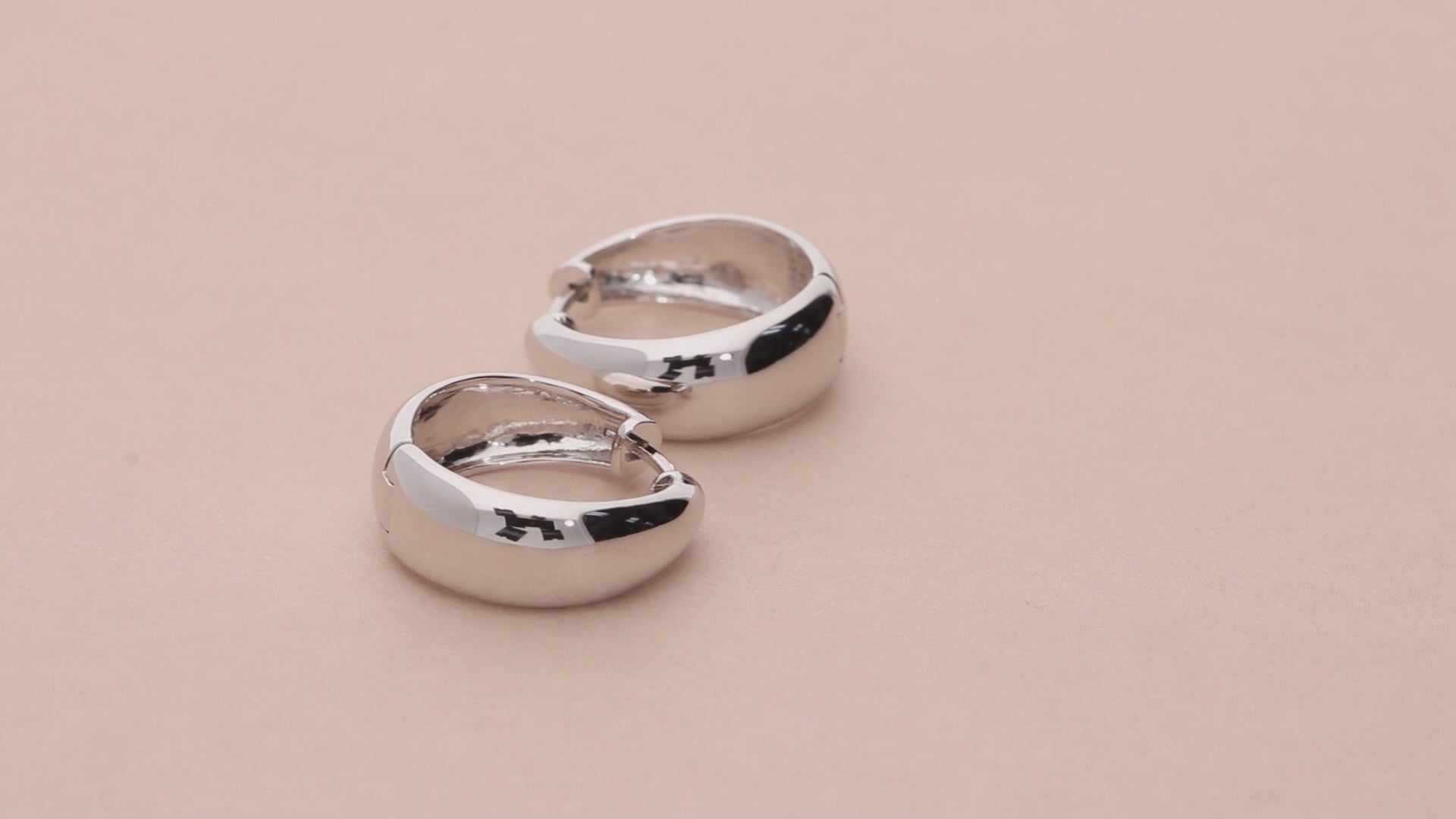 Video Contains Dome Medium Hoop Earrings in Sterling Silver 0.75". Style Number E1843