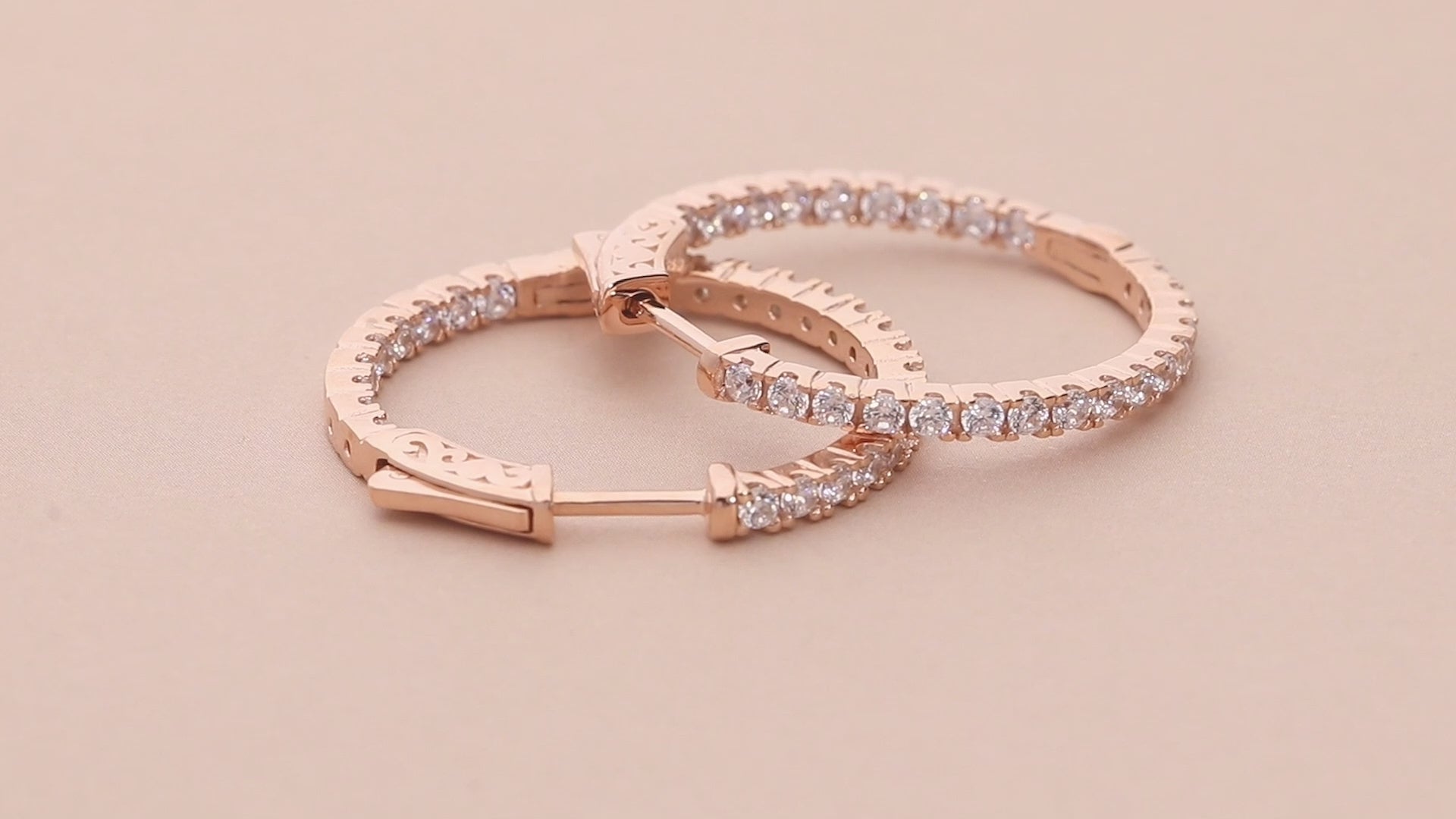 Video Contains CZ Medium Inside-Out Hoop Earrings in Sterling Silver 1". Style Number E948-VP