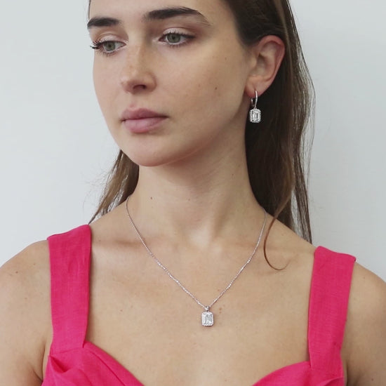 Video Contains Halo Emerald Cut CZ Pendant Necklace in Sterling Silver. Style Number N1269-01