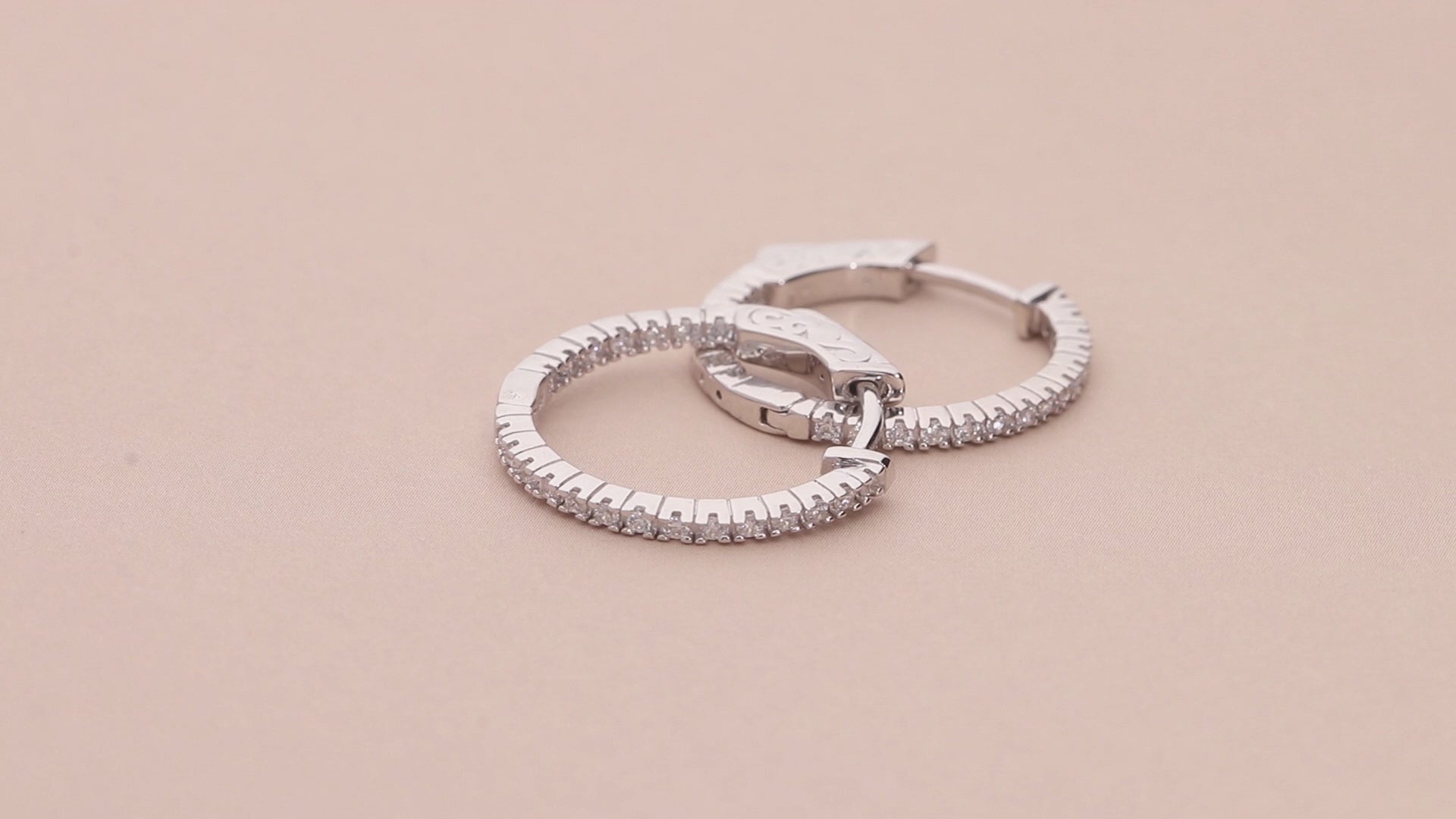 Video Contains CZ Inside-Out Hoop Earrings in Sterling Silver, 2 Pairs. Style Number VS815-01