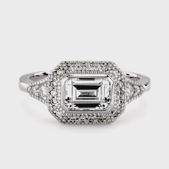 Video Contains Halo East-West Emerald Cut CZ Ring in Sterling Silver. Style Number R1496-01
