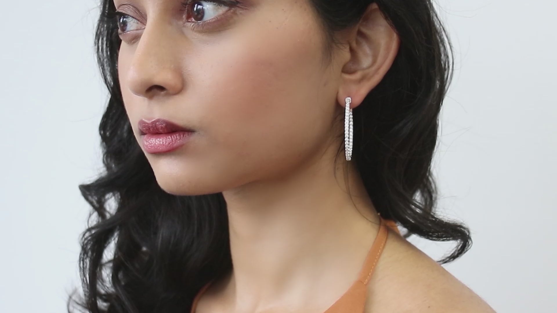 Video Contains Oval CZ Medium Inside-Out Hoop Earrings in Sterling Silver 1.4". Style Number E1269