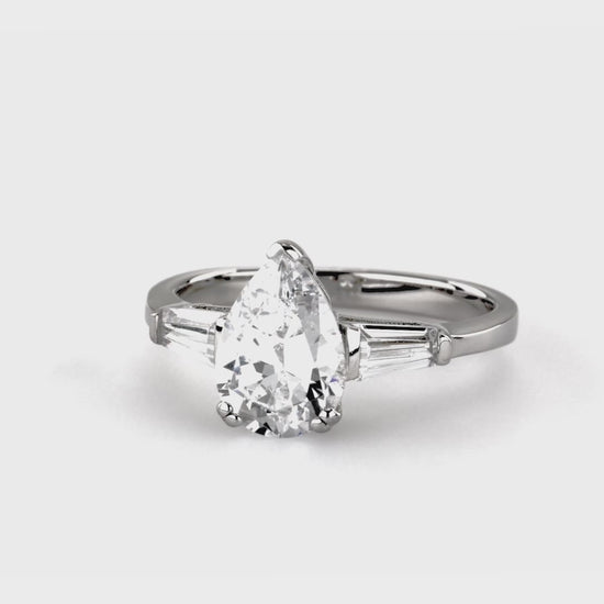 Video Contains Solitaire 1.8ct Pear CZ Ring in Sterling Silver. Style Number R1181-01