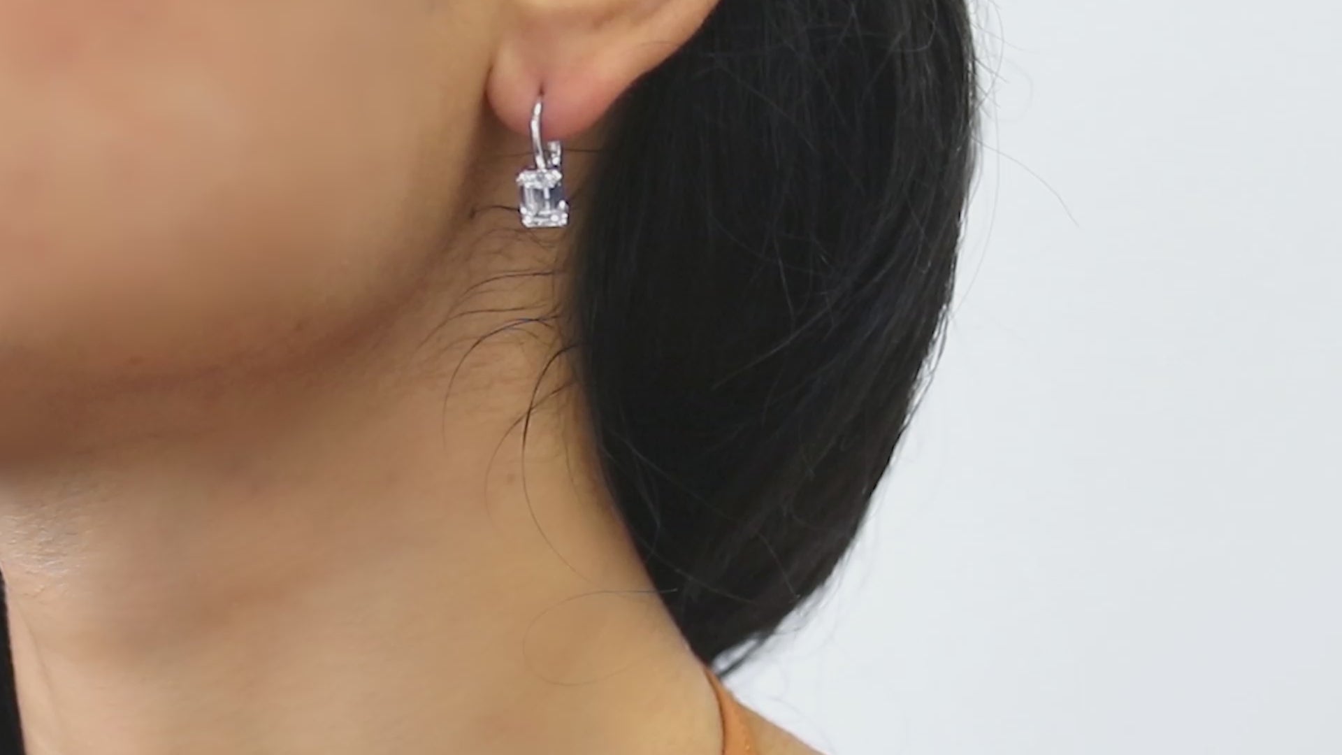 Video Contains Solitaire 2.4ct Emerald Cut CZ Leverback Earrings in Sterling Silver. Style Number E1246
