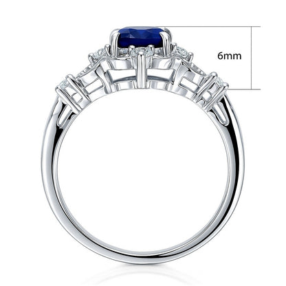 Halo Art Deco Sapphire-Blue Oval CZ Ring in Sterling Silver