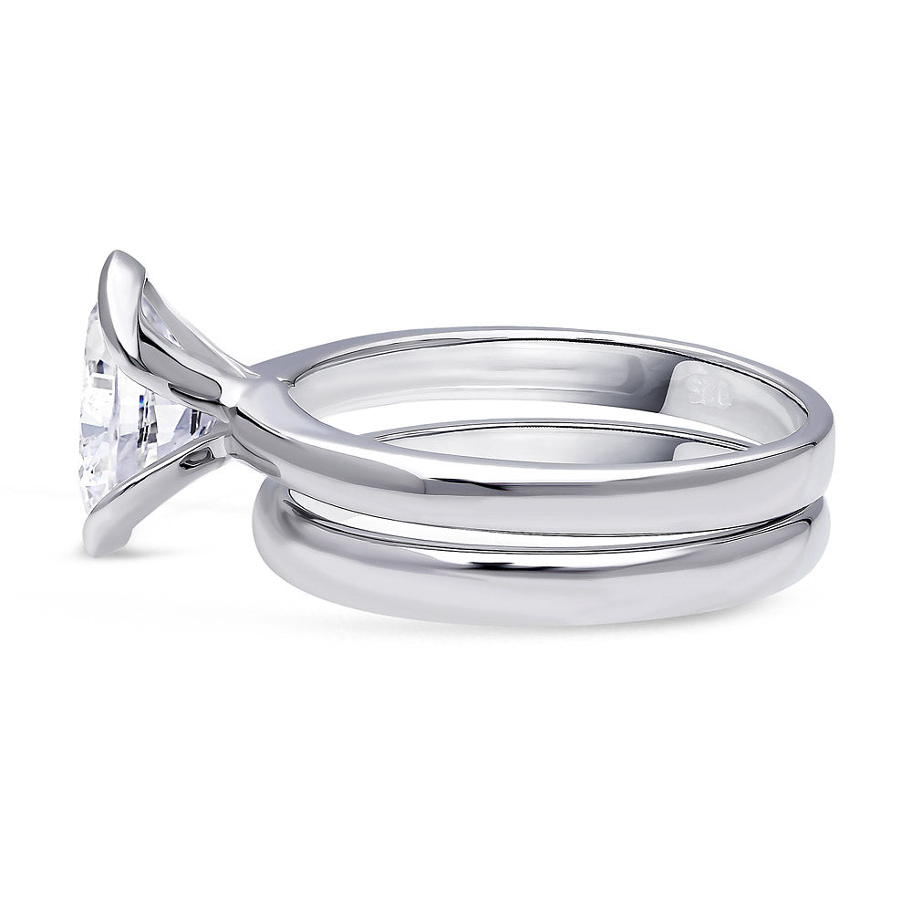 Angle view of Solitaire 1.8ct Bezel Oval CZ Ring Set in Sterling Silver, 5 of 6