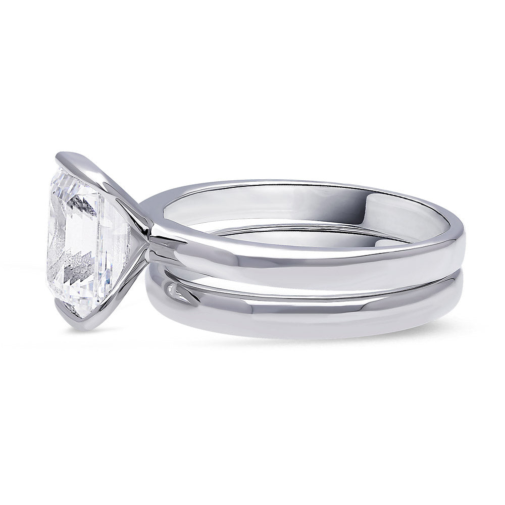 Angle view of Solitaire 2.6ct Bezel Emerald Cut CZ Ring Set in Sterling Silver, 5 of 9