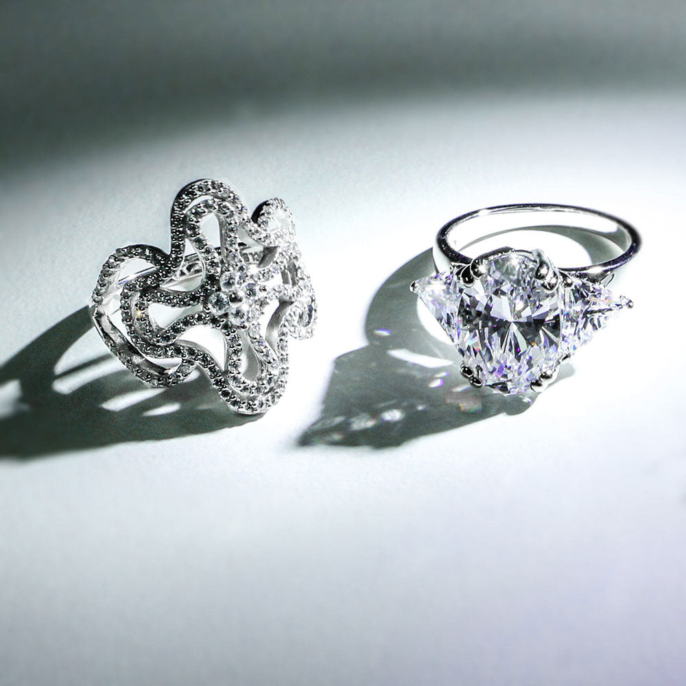 Image Contain: 3-Stone Ring, Cross Ring