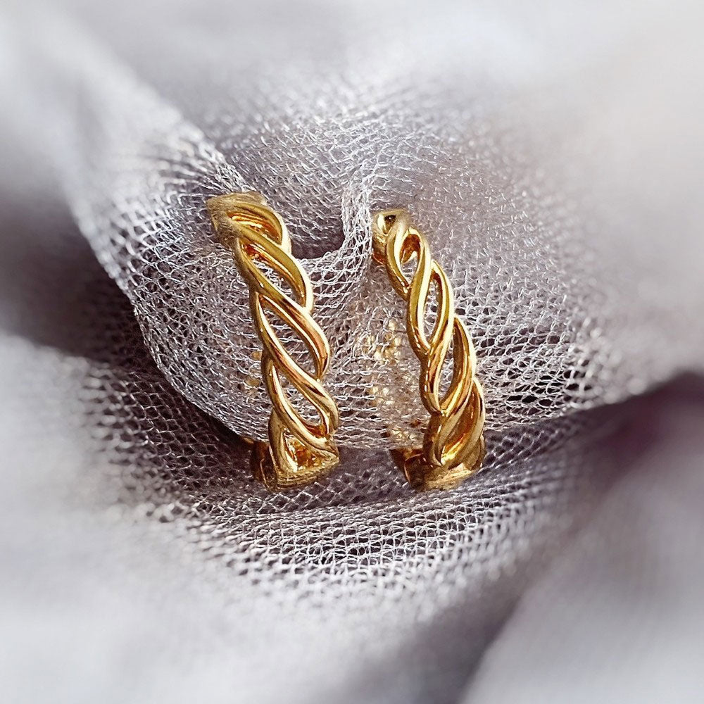 Flatlay view of Woven Small Hoop Earrings in Sterling Silver 0.7 inch, Yellow Gold Flashed