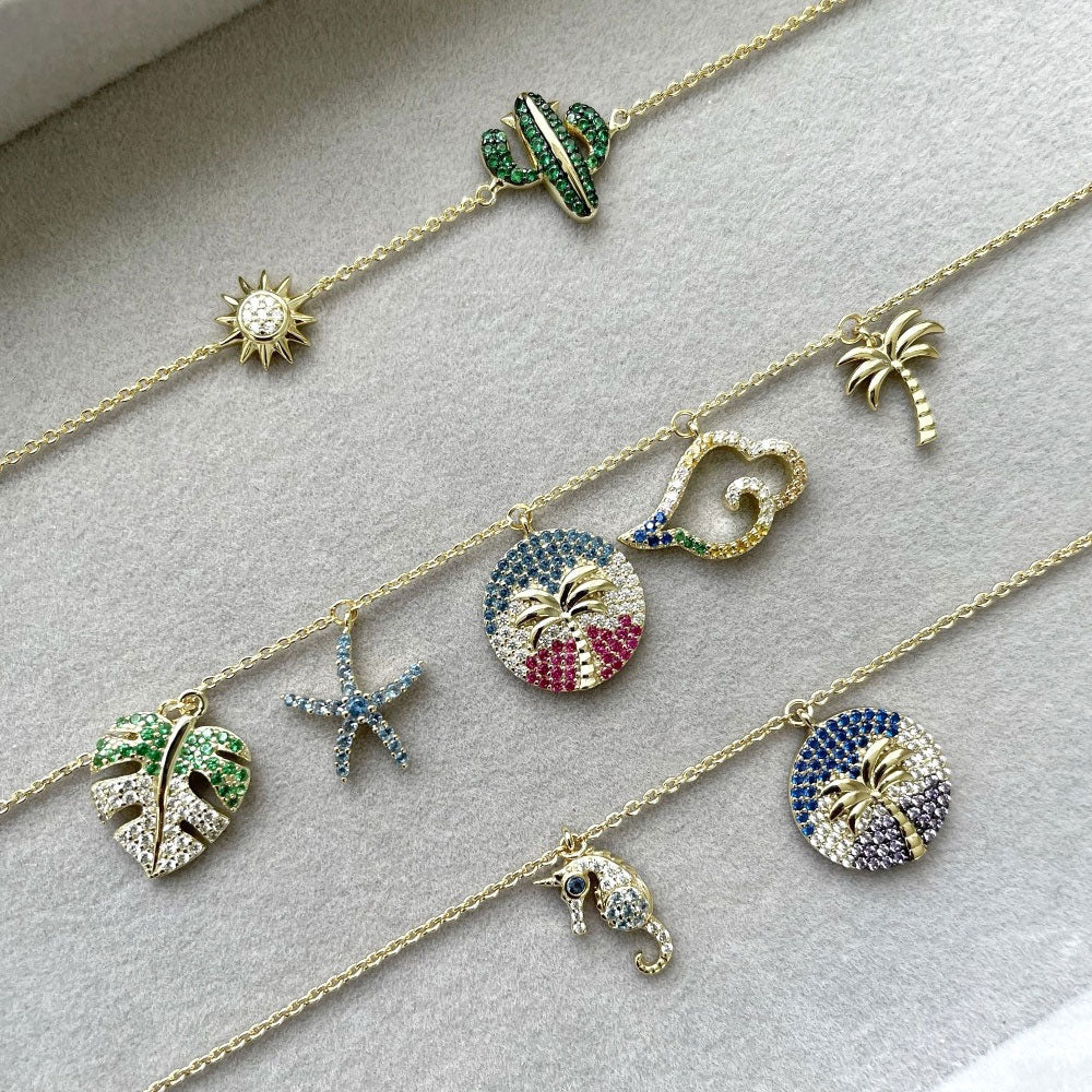 Flatlay view of Seahorse CZ Charm Bracelet in Gold Flashed Sterling Silver, 2 of 2