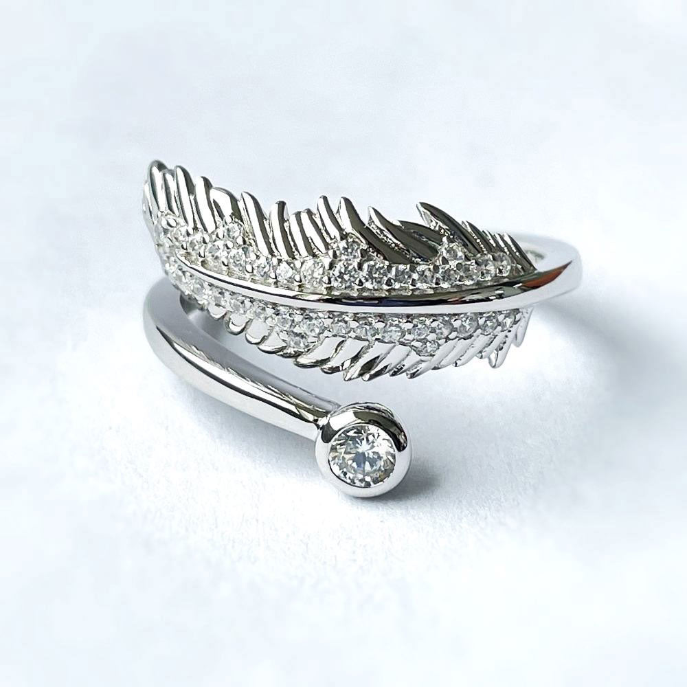 Flatlay view of Feather Bypass Wrap CZ Ring in Sterling Silver, 9 of 9