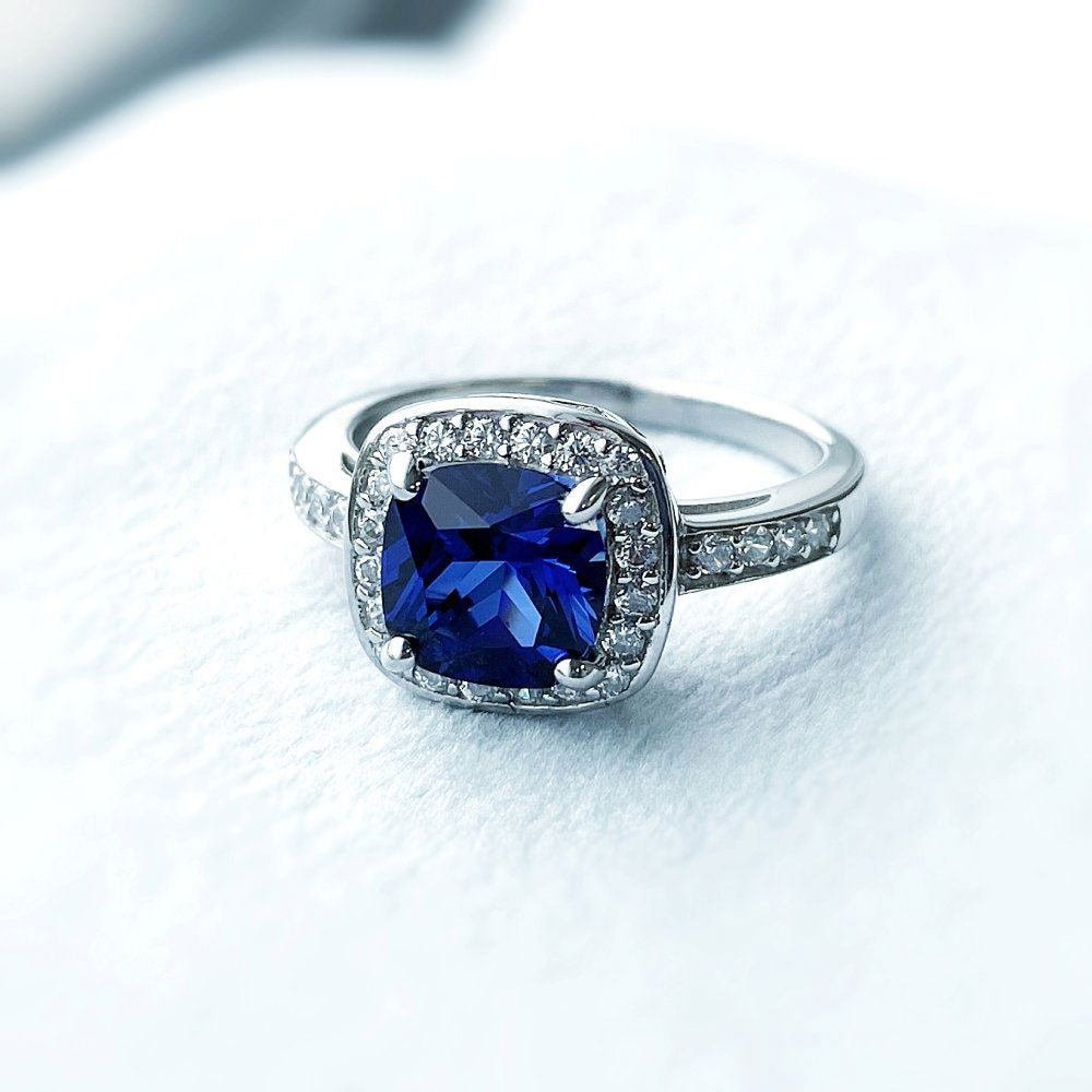 Halo Simulated Blue Sapphire Cushion CZ Ring in Sterling Silver