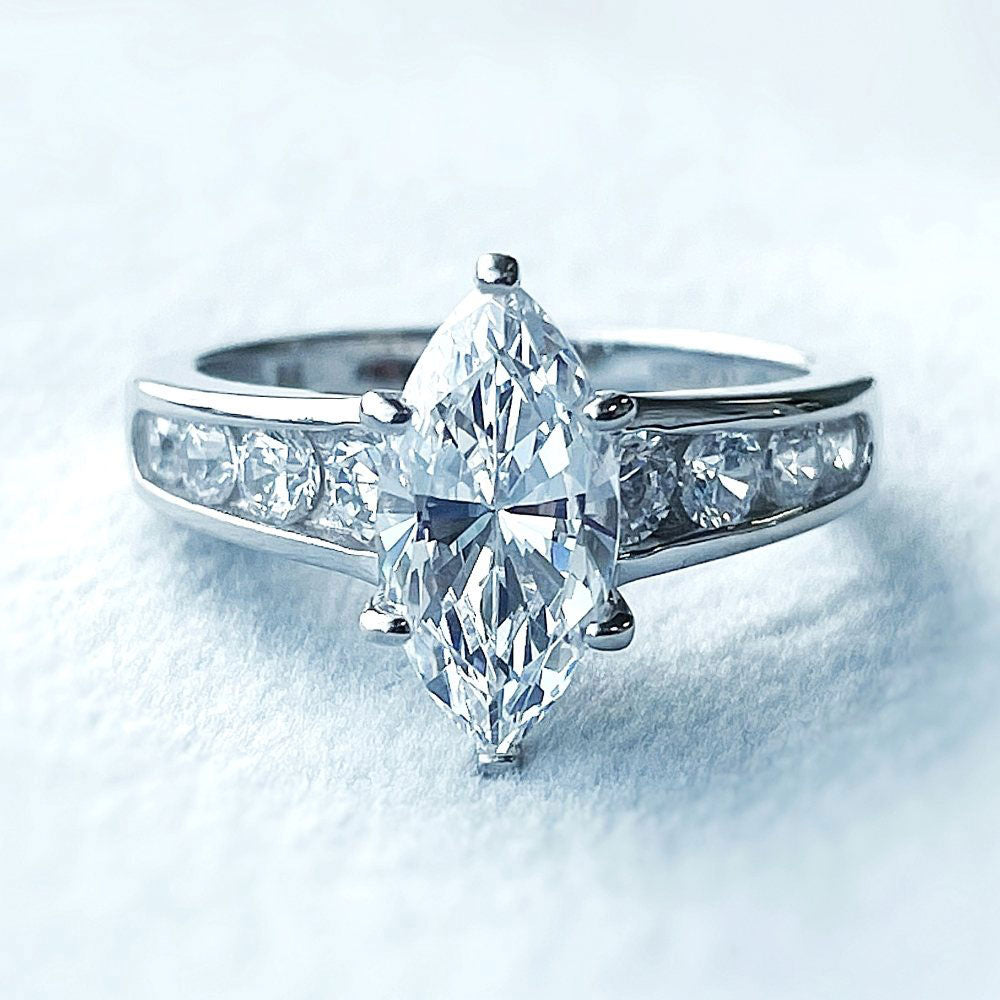 Flatlay view of Solitaire 1.6ct Marquise CZ Ring Set in Sterling Silver, 14 of 18