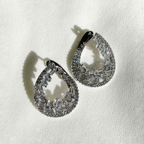 Image Contain: Teardrop Hoop Earrings